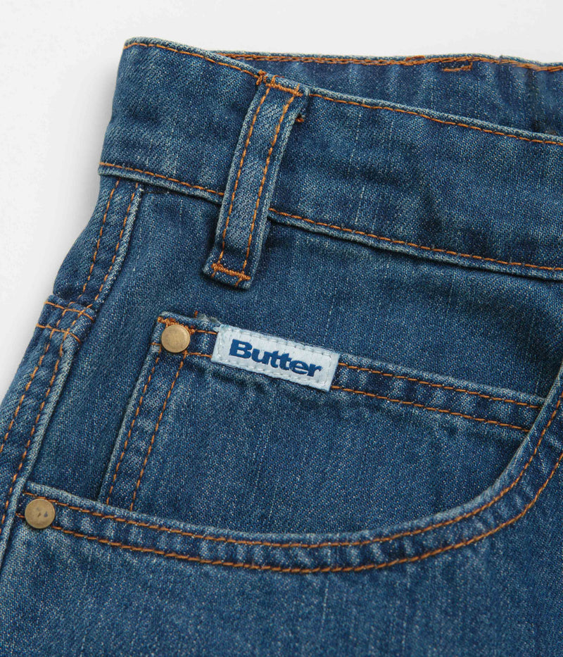 Butter Goods x Peanuts Spike Denim Jeans in Distressed Indigo