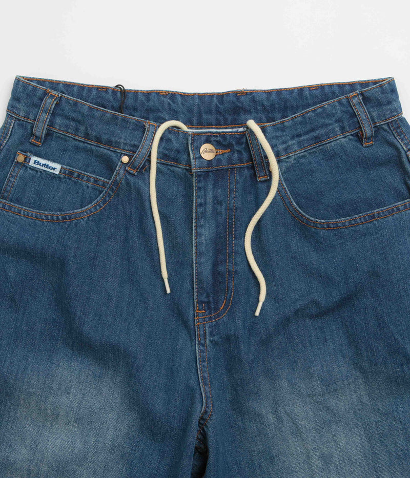 Butter Goods x Peanuts Spike Denim Jeans in Distressed Indigo
