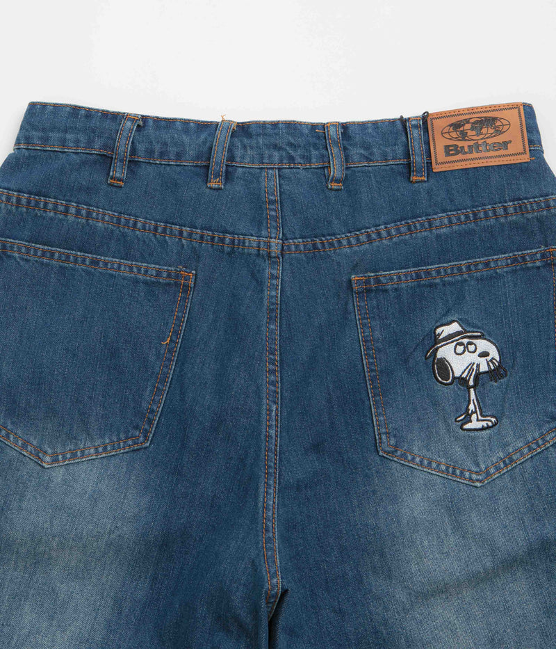 Butter Goods x Peanuts Spike Denim Jeans in Distressed Indigo