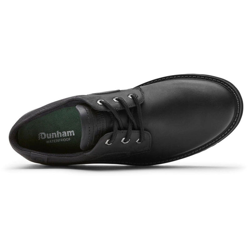 Dunham Byrne Oxford shoes in black leather with waterproof construction, padded green insole, and lace-up design, top view.