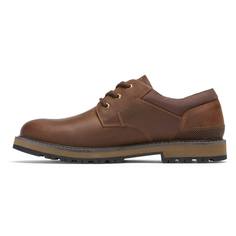 Dunham Byrne Oxford shoes in brown leather with textured heel panel, stitching details, and lugged outsole, side view.