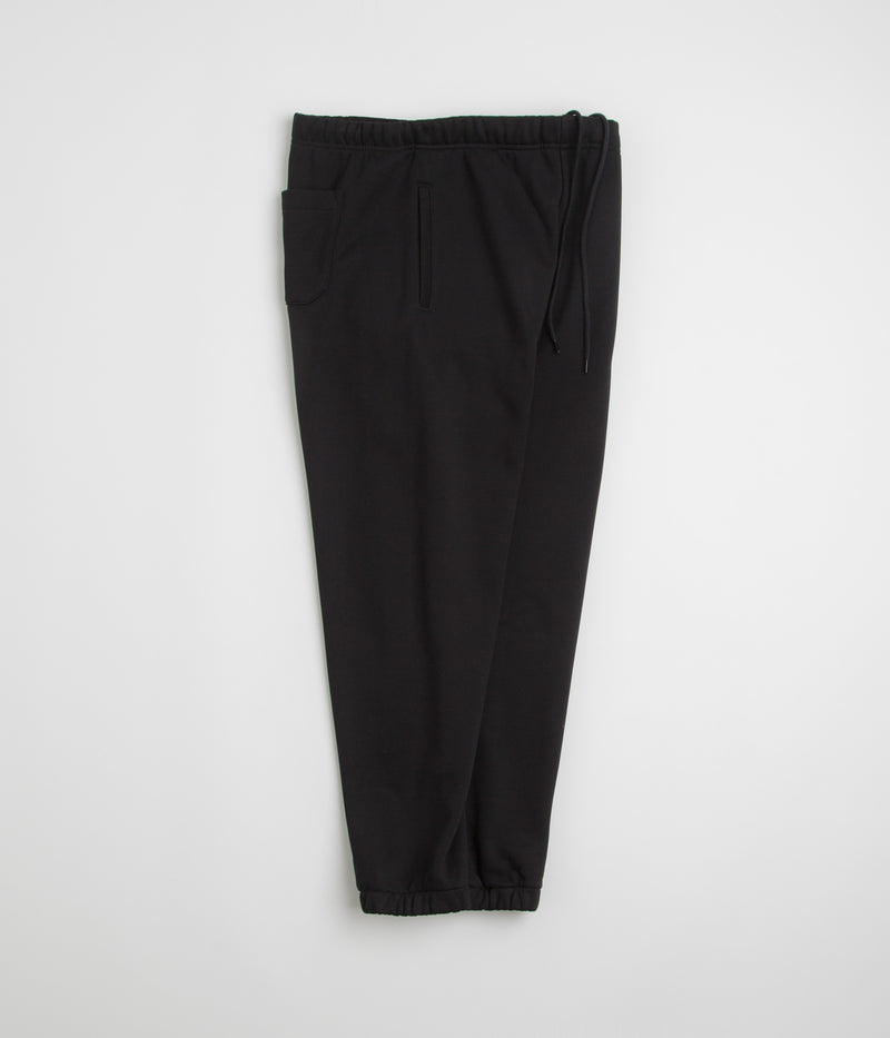 Carhartt Chase Sweatpants in Black and Gold