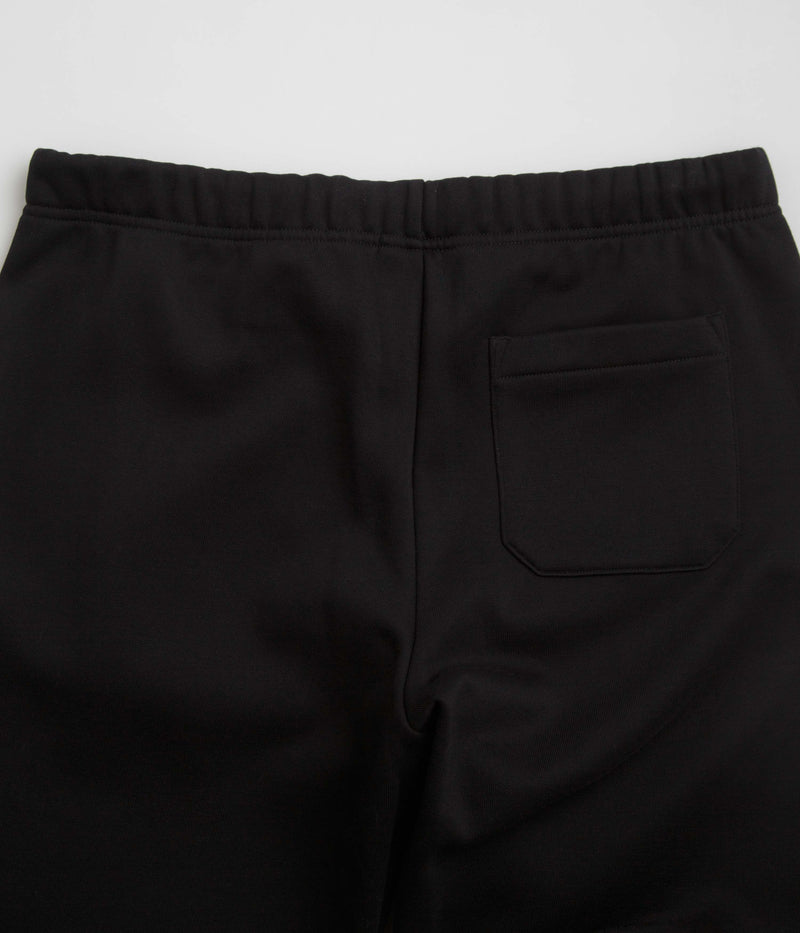 Carhartt Chase Sweatpants in Black and Gold