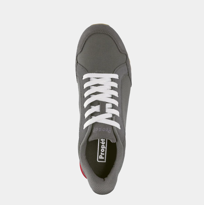 Propét Carmine Step In Sneakers top view in gray with breathable mesh upper, white laces, and padded collar.