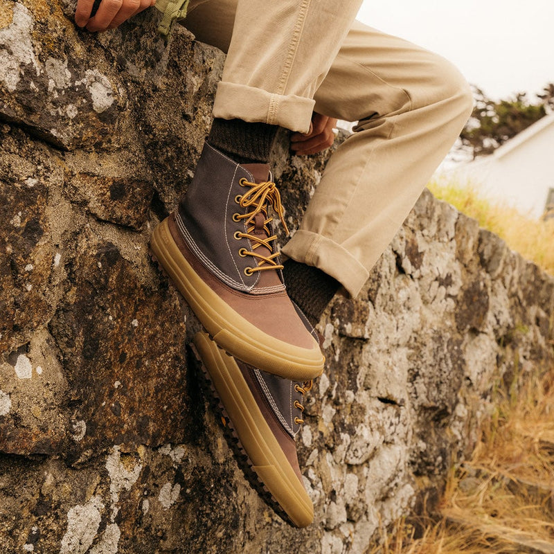 SeaVees Cascade Range Boot in brown and gray with durable canvas upper, yellow laces, and rubber outsole, worn outdoors.