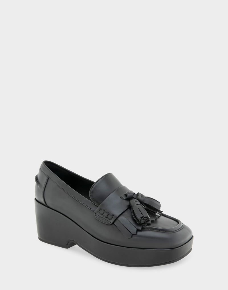 Comfortable Women's Flatform Loafer In Black Faux Leather Angle View
