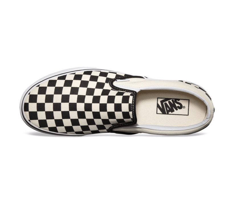 Vans Checkerboard Slip On shoes, black and white checkerboard canvas upper with white rubber outsole, top view.