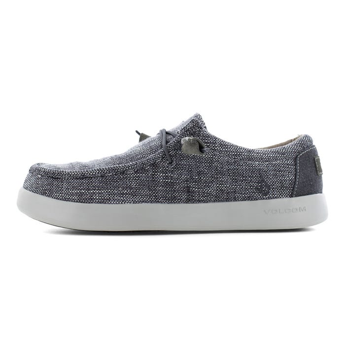 Volcom Chill Composite Toe Slip-On shoes in textured dark gray fabric with composite toe and cushioned white sole, side view.