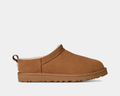 UGG Classic Micro boots in chestnut brown suede with a pull tab and plush lining, side view.