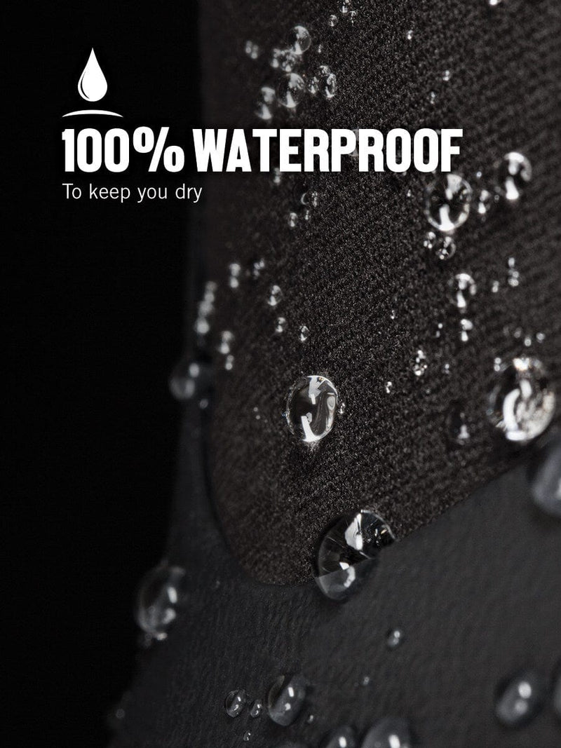 Bogs Classic Mid Boot close-up showing black waterproof material with water-resistant texture and water droplets.