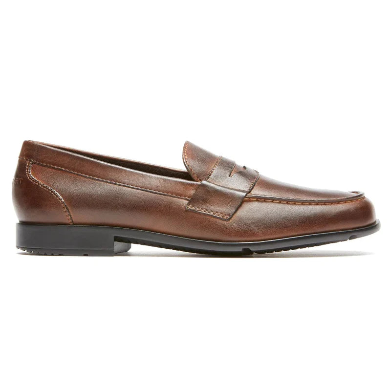 Rockport Classic Penny Loafers in brown leather with hand-stitched details and slip-on design, side view.