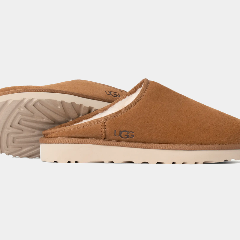 UGG Classic Slip-On shoes in chestnut brown suede with plush shearling lining and cream-colored outsole, side view.