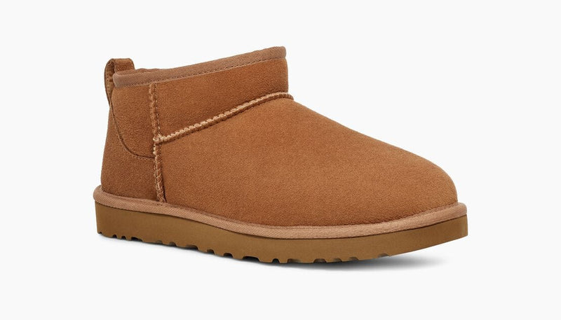 UGG Classic Ultra Mini Boot in chestnut suede with plush lining and durable Treadlite by UGG outsole, side angle view.