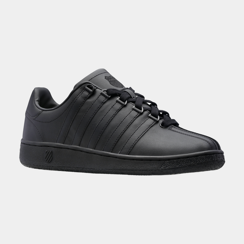 K-Swiss Classic VN sneakers in all-black leather with signature five-stripe design and lace-up closure, side view.