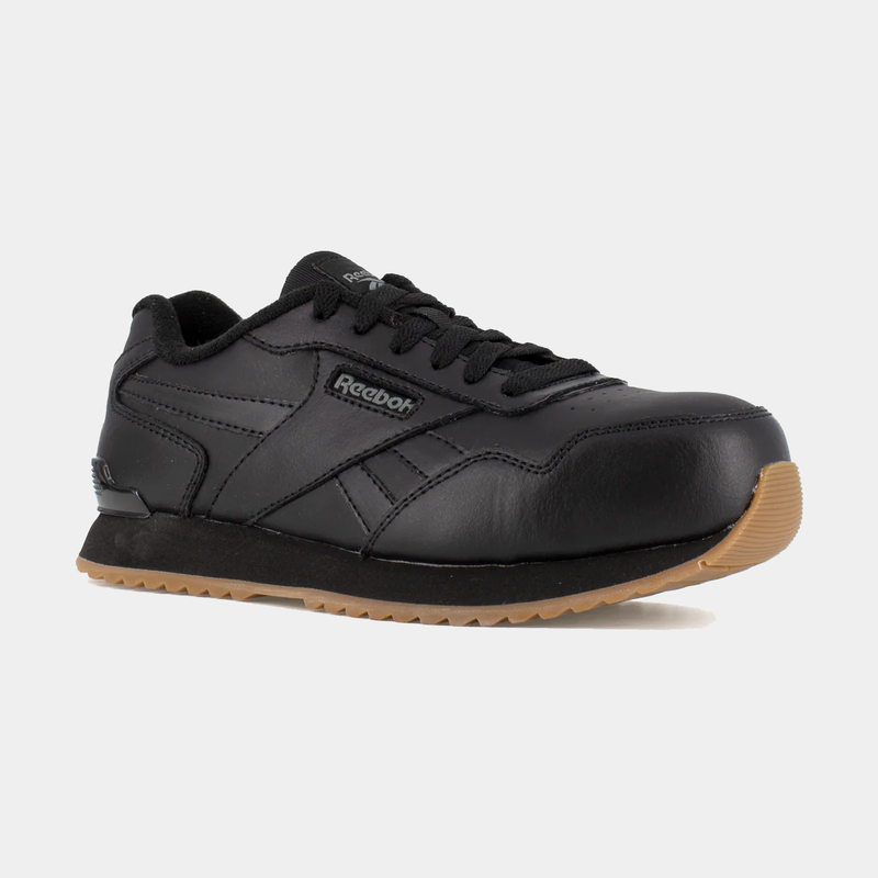 Reebok Work Classic Work Sneaker in black leather with gum outsole and padded collar, side angle view.