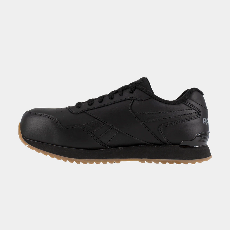 Reebok Work Classic Work Sneaker in black leather with gum outsole and padded collar, side view.
