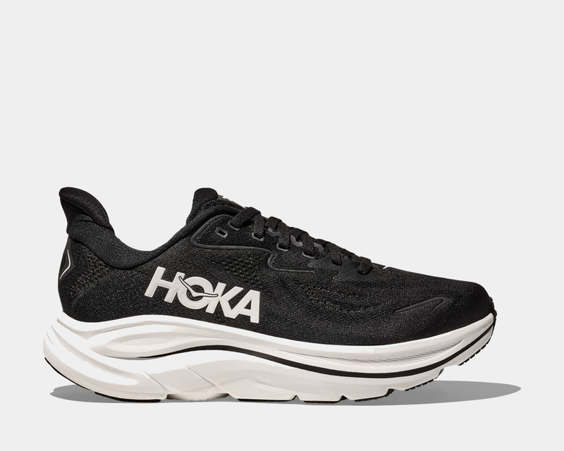 HOKA Clifton 10 running shoes in black with breathable mesh upper, cushioned midsole, and contrasting white outsole, side view.