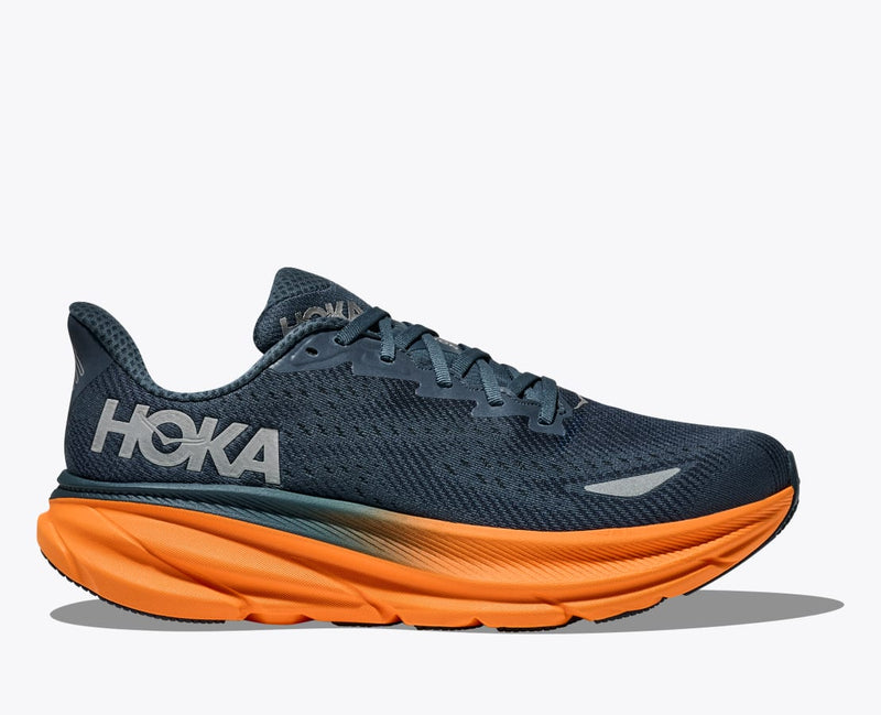 HOKA Clifton 9 GTX running shoes in navy blue with orange cushioned midsole and waterproof upper, side view.