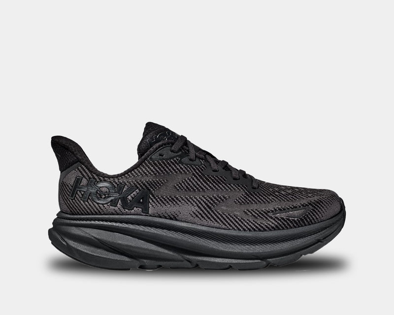 HOKA Clifton 9 running shoes in black with mesh upper, cushioned midsole, and lightweight design, side view.