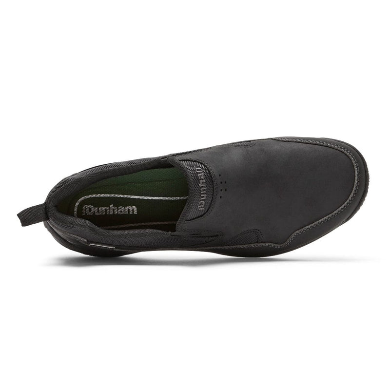 Dunham Cloud Plus Waterproof Slip-On shoe in black leather with stitched accents and pull-tab, top view showing interior green footbed.