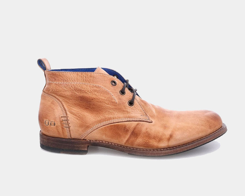 Bed Stu Clyde Chukka boots in distressed tan leather with clean stitching and layered sole, side view.
