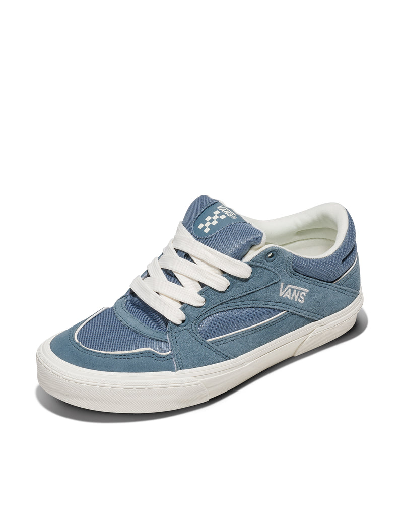 Vans Colson skate shoes in light blue with canvas upper, suede overlays, white laces, and rubber outsole, angled front view.