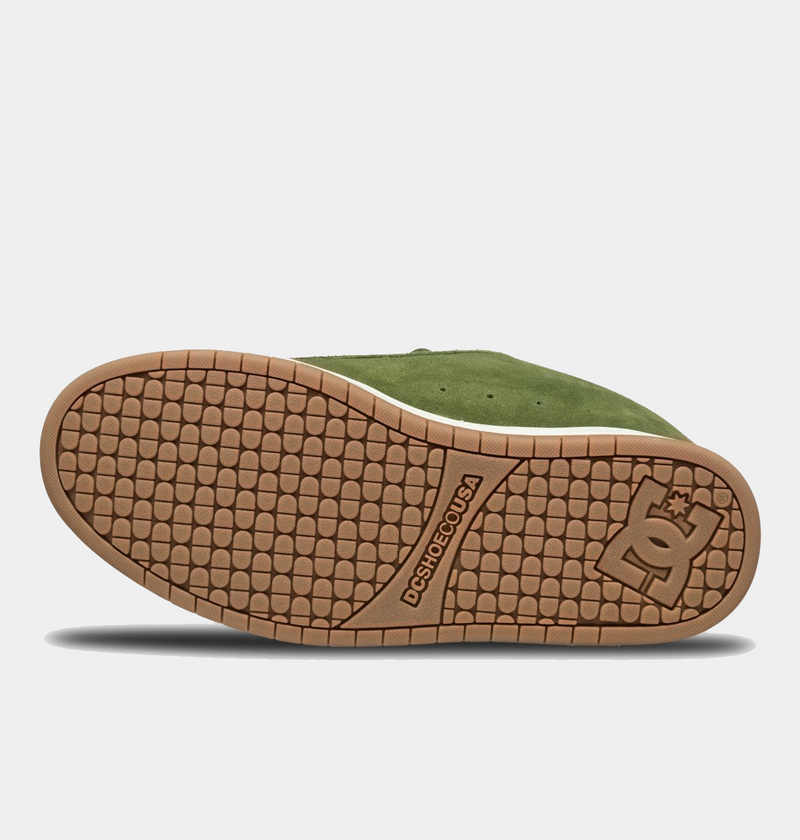 DC Footwear Court Graffik SE skate shoes outsole in gum rubber with textured tread pattern and branding, sole/bottom view.
