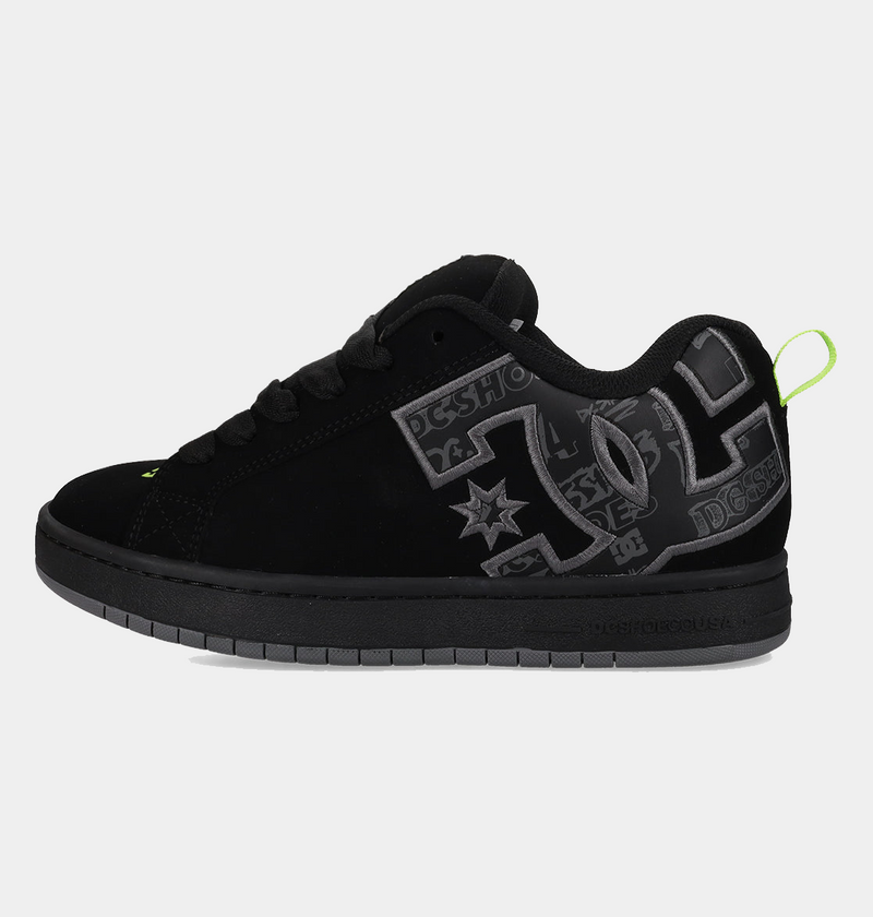 DC Footwear Court Graffik skate shoes in black with gray logo detailing and neon green heel tab, side view.