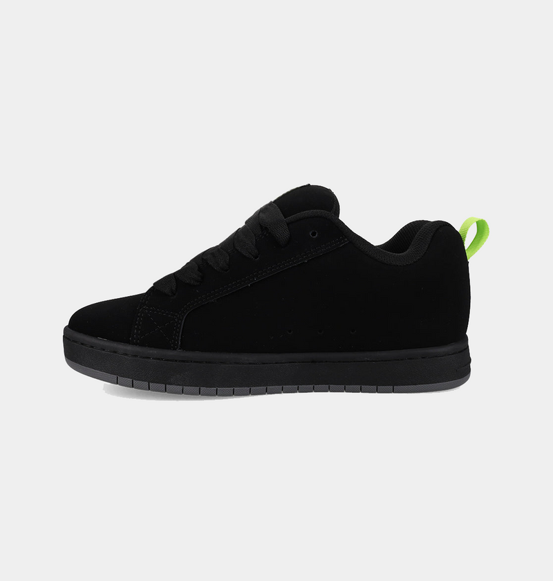 DC Footwear Court Graffik shoes in black with suede upper, tonal black sole, and neon green heel tab, side view.