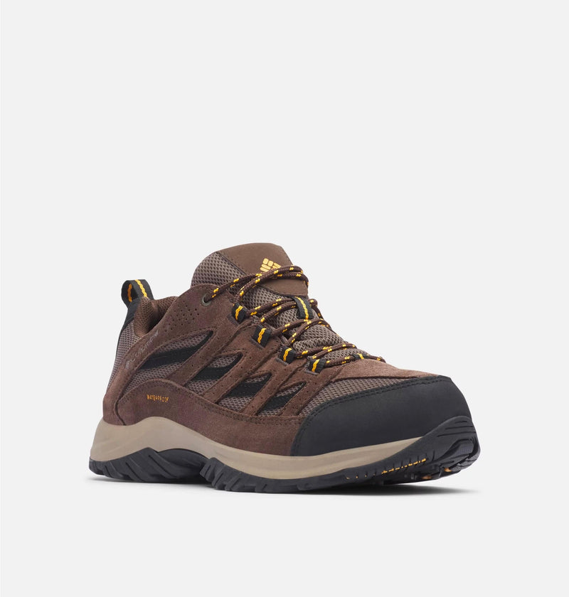 Columbia Crestwood Waterproof hiking shoes in brown with mesh upper, black toe cap, and yellow accents, front-side view.