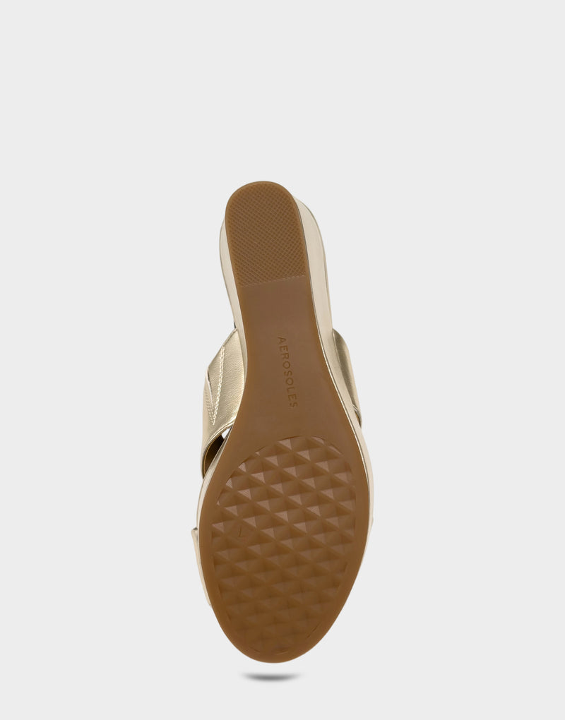 Comfortable Women's Wedge Sandal in Soft Gold Faux Metallic Leather Bottom View