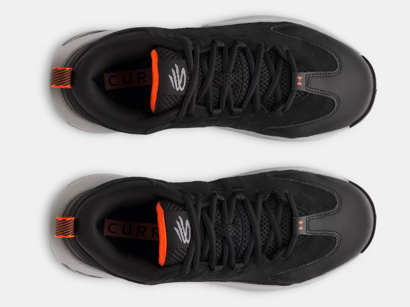 Under Armour Curry 3Z 25 SDE basketball shoes top view in black with orange accents, mesh upper, and lace system.