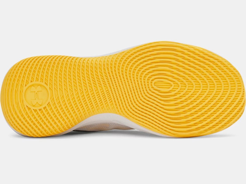 Under Armour Curry Splash 25 basketball shoe outsole with textured yellow rubber and durable grip pattern, bottom view.