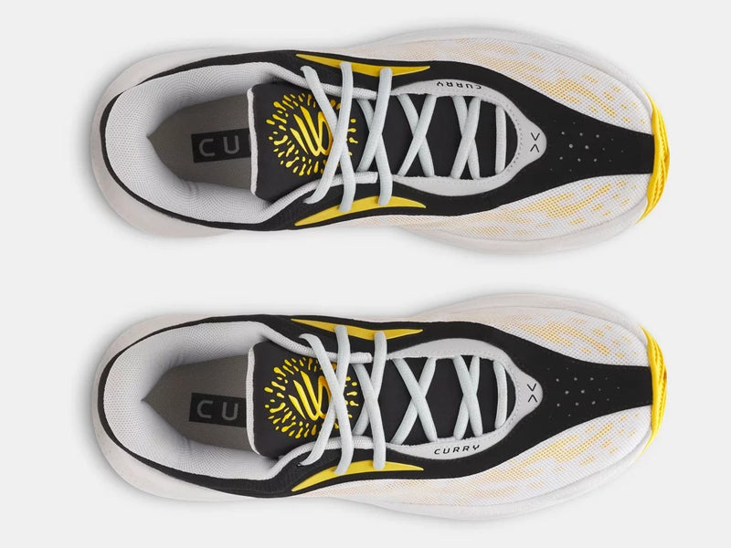 Under Armour Curry Splash 25 basketball shoes top view featuring white mesh upper, black overlays, yellow accents, and secure lace system.