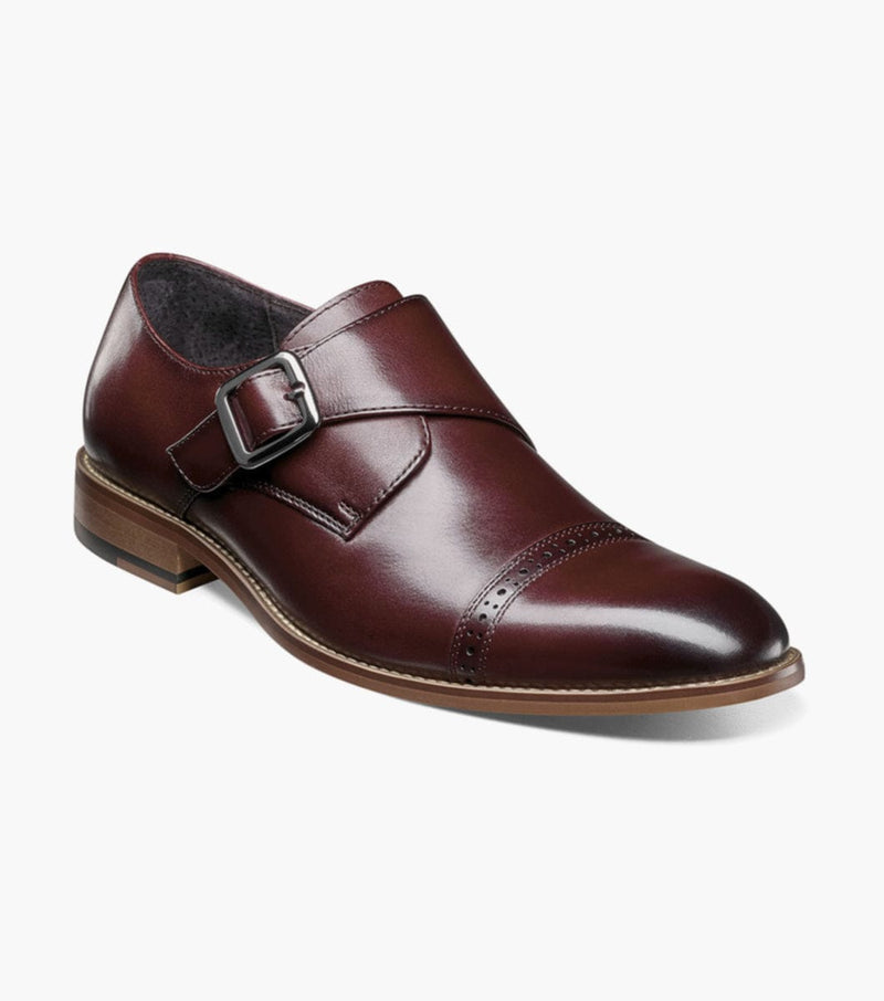 Stacy Adams Desmond Cap Toe Monk Strap dress shoes in burgundy leather with cap toe perforation and buckle strap, angled view.