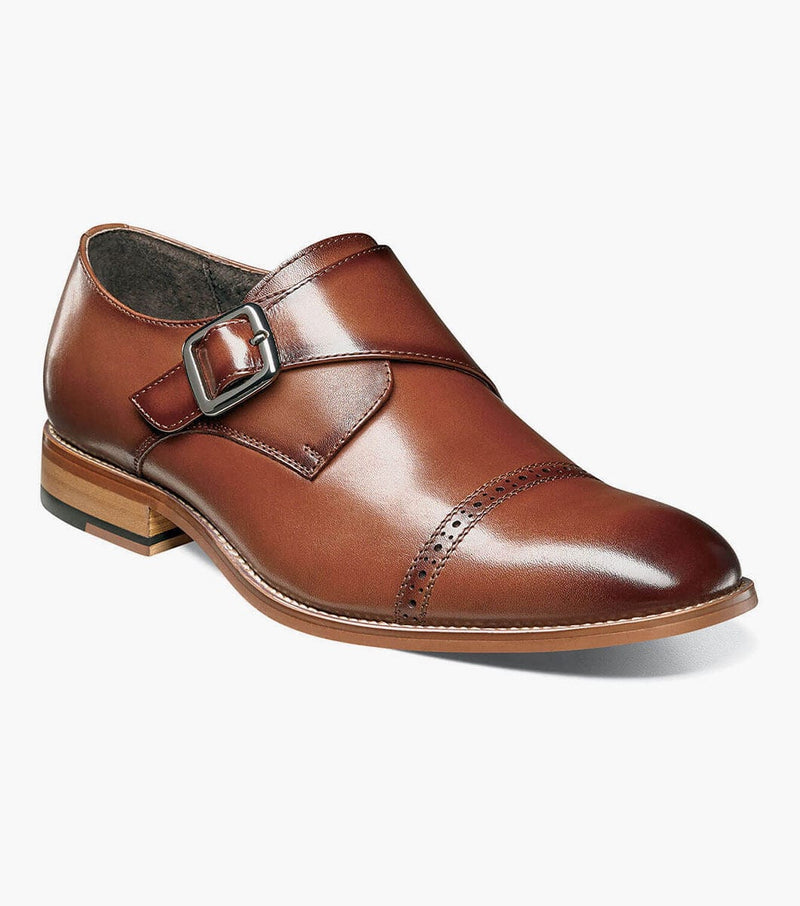 Stacy Adams Desmond Cap Toe Monk Strap shoe in cognac brown leather with perforated detailing and silver buckle, side angled view