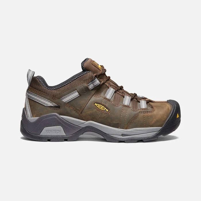 Keen Detroit XT Steel Toe ESD work shoes in dark brown leather with gray accents and durable slip-resistant outsole, side view.