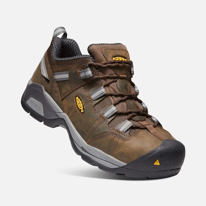 Keen Detroit XT Steel Toe ESD work shoes in brown leather with gray accents, cushioned sole, and steel toe protection, angled side view.
