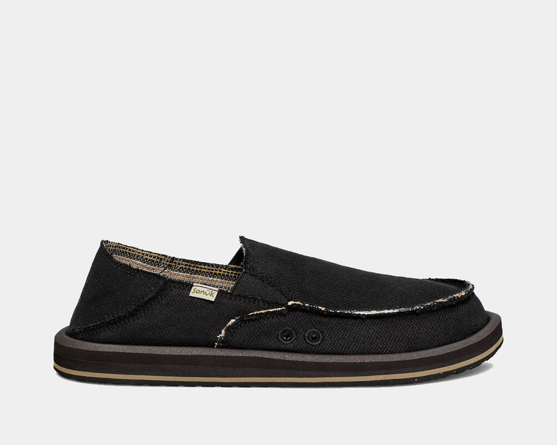 Sanuk Donny Hemp 2 Tone casual slip-on shoes in black with frayed edges and cushioned brown outsole, side view.