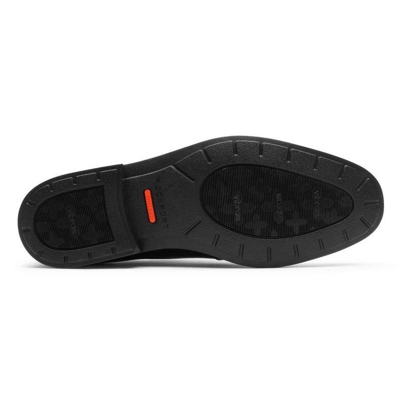 Rockport Dressports Premium Waterproof Oxford shoe sole, black Vibram outsole with slip-resistant tread and red detailing.