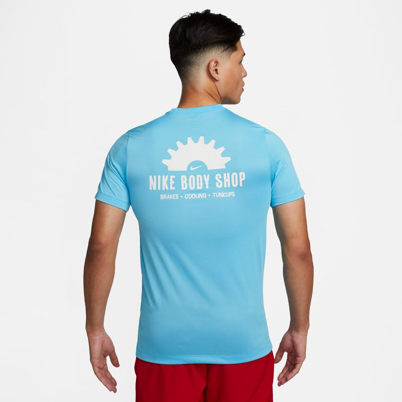 Nike Dri-FIT Fitness T-Shirt in light blue with "Nike Body Shop" graphic detailing on the back, back view.