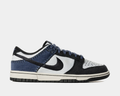 Nike Dunk Low Retro sneakers in black, white, and navy with stitched details and perforated toe box, side profile view.