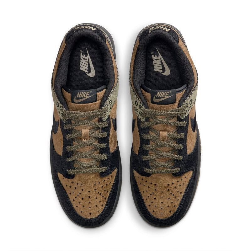 Nike Dunk Low Retro sneakers in brown and black with perforated suede toe box and textured laces, top view.