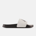 New Balance DynaSoft 200v2 slide sandals in white with black sole and cushioned footbed, side view.