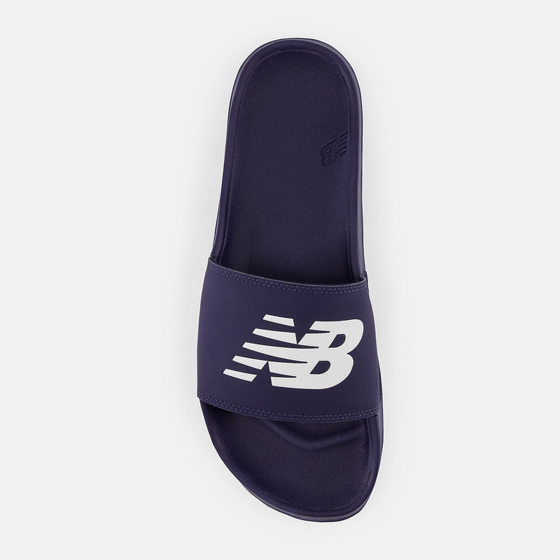 New Balance DynaSoft 200v2 slide sandal in navy blue featuring wide strap with white logo, top view.