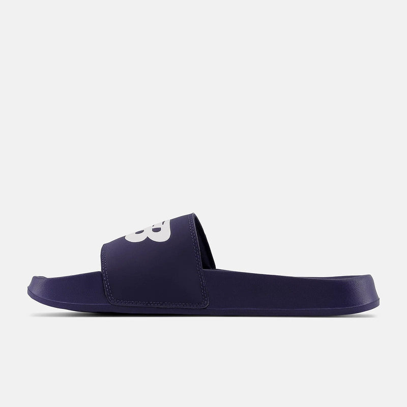 New Balance DynaSoft 200v2 slides in navy blue with a wide strap featuring white branding, side view.