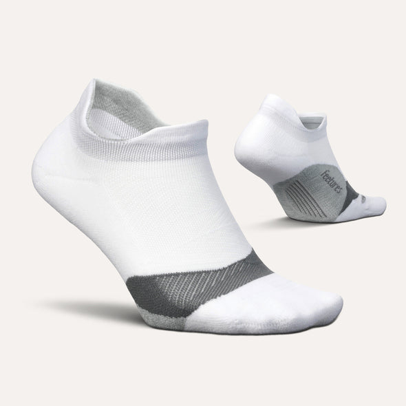 Feetures Elite Light Cushion No Show Tab socks in white with gray accents, side view.