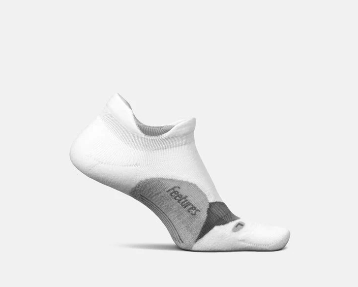 Feetures Elite Light Cushion No Show Tab socks, white with gray accents, side view showing arch support.