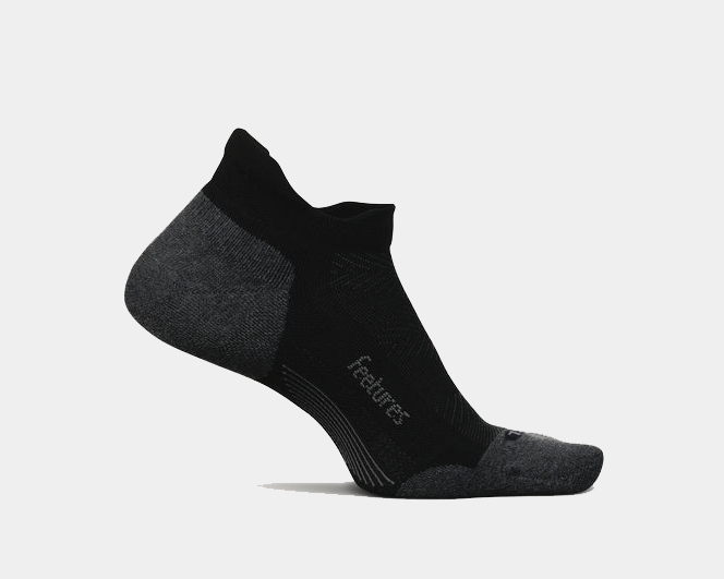 Feetures Elite Max Cushion No Show Tab socks in black and gray with enhanced cushioning and tab design, side view.