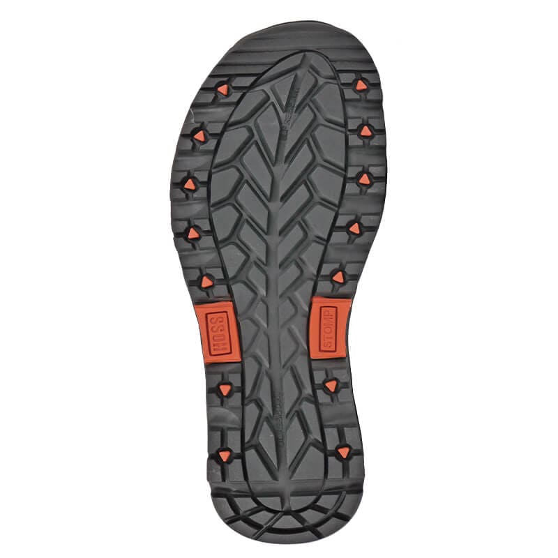 Hoss Eric Lo Aluminum Safety Toe outsole in black rubber with orange traction accents and deep tread pattern, sole/bottom view.